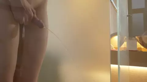 Naughty Redhead shemale Jelena Vermilion pissing in the shower