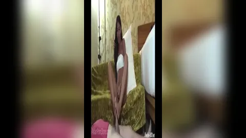 Ladyboy Beth gives footjob and cums on his cock